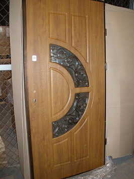 Двері вхідні металеві з МДФ накладками виготовлення