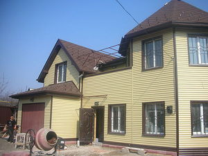 Дом в металлическом сайдинге. &mdash; Донбасс Престиж Строй